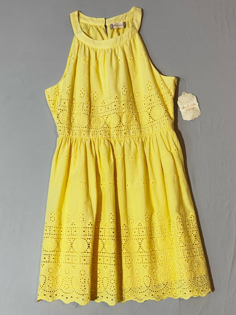 Altar’d State light yellow halter dress. Junior size large Lined Cotton NWT